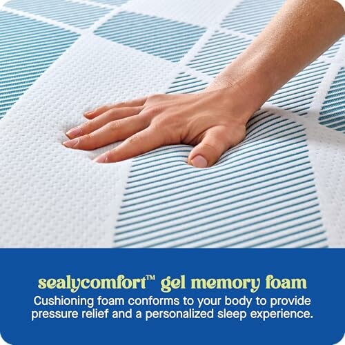 Hand pressing on gel memory foam mattress surface.