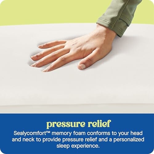 Hand pressing into memory foam mattress for pressure relief.