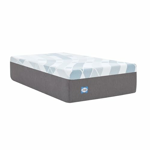 Sealy mattress with grey and white design.